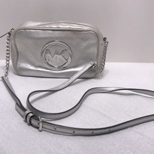 Metallic silver Michael Kors crossover bag